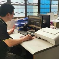 Staff recording delivery information (001)